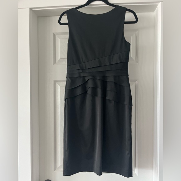 Beautiful fitted black satin LBD with flattering ruffle detail. US size 6. - Picture 3 of 4